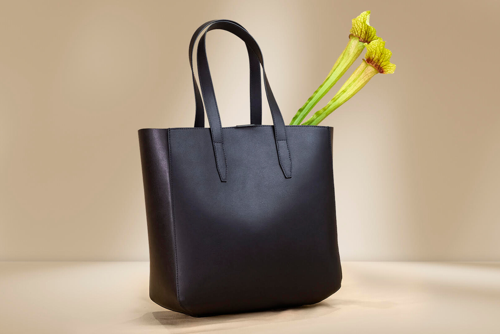 Image of a black tote bag made from Alt. Leather's leather alternative.